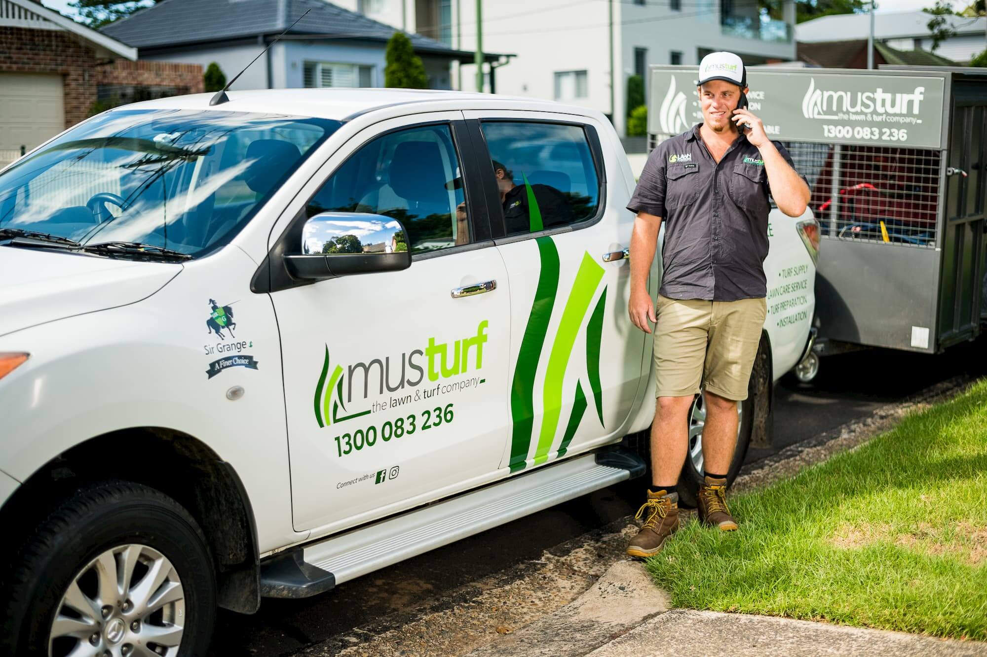 Musturf Staff and a company service car