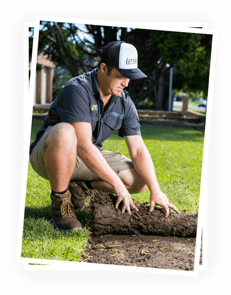 A musturf staff removing turf grass