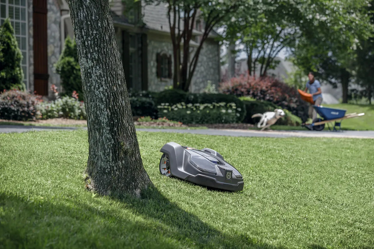 Husqvarna 430X Automower® Working on a Front Yard